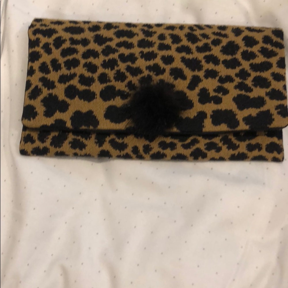 LKN Leopard clutch with mink pompom